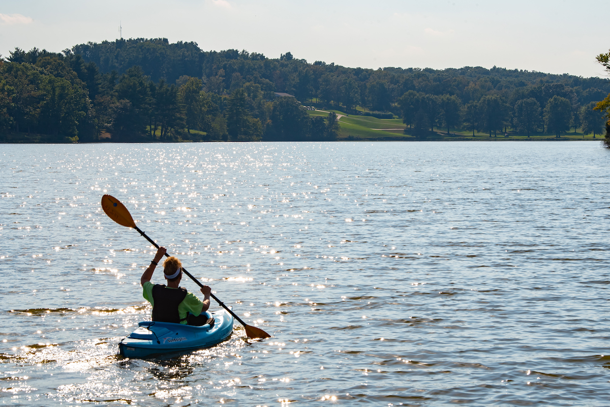 Woman paddling kayak in Northern Kentucky